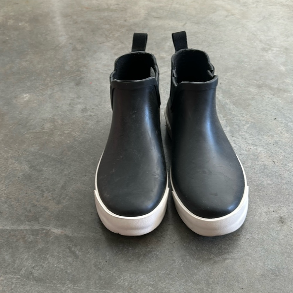 Black and white ankle boots.
